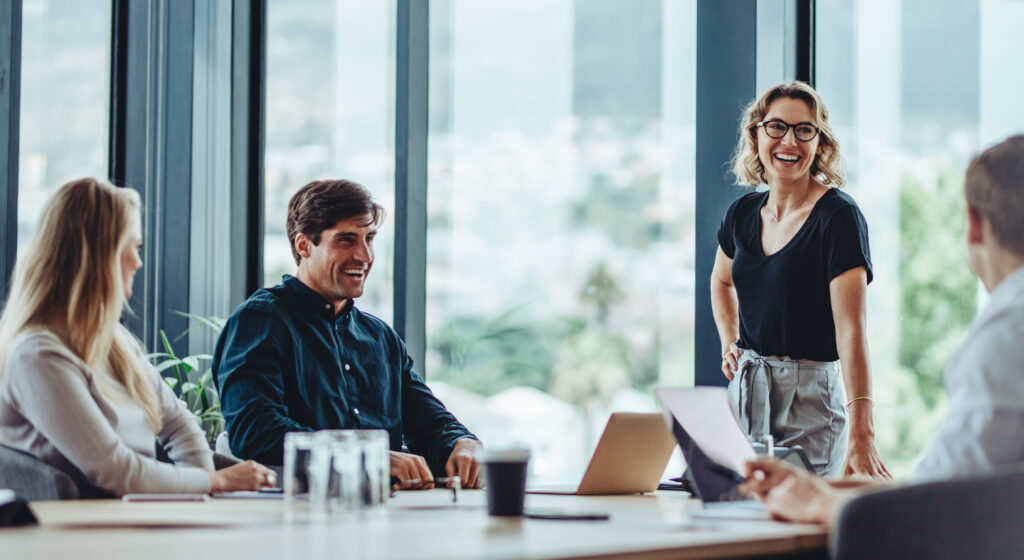 Business people having a meeting around a conference room table